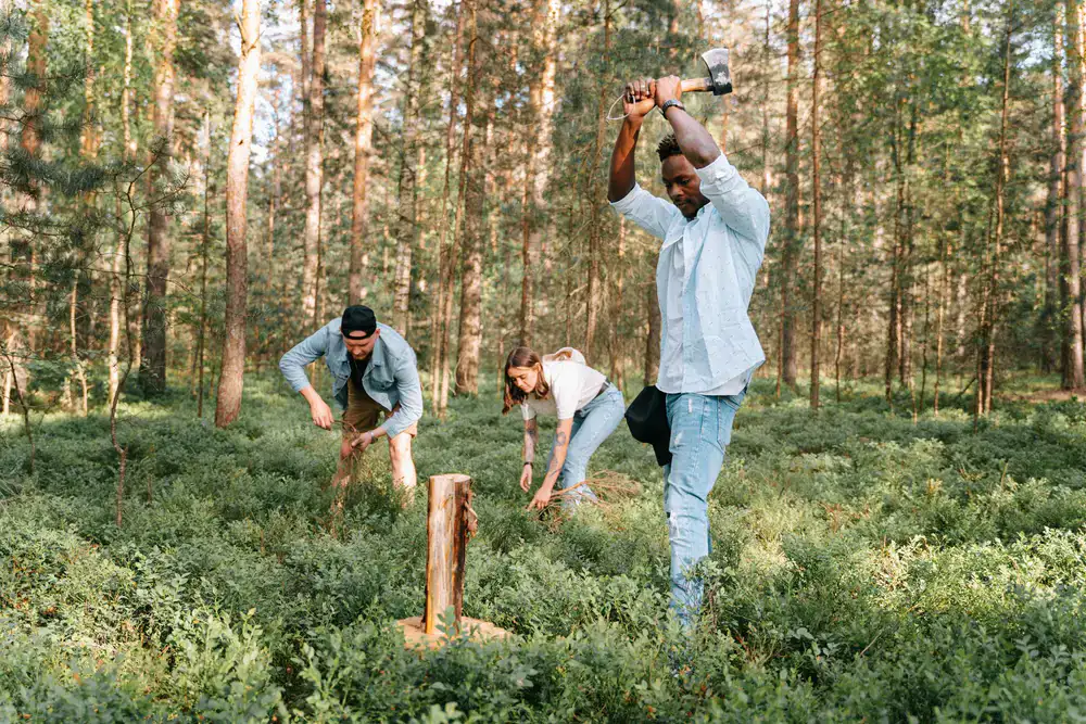 Group of friends laughing with axes